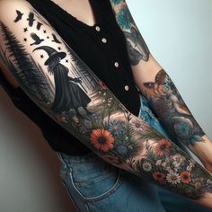 a woman with tattoos on her arms and arm