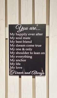 a sign that is on the side of a building saying you are my happily ever after my soul mate