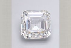 an emerald cut diamond on a white background