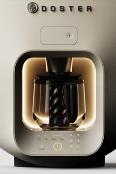 a coffee maker with its light on inside