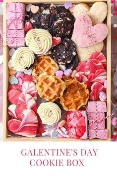 valentine's day cookie box with heart shaped candies, cookies and other treats