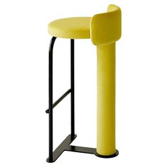 a yellow stool sitting next to a black metal stand with a tube on the back