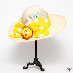 A breezy open weave natural Panama hat, with an unblocked soft brim and a fun and bright bow that will be the star of the show! Wear this hat with a matching sun dress, or with jeans and a t-shirt for a casual spin. Brim size is 3" 3/4 . Crown is 13" 3/4 Can be adjusted to your head size (up to 23" 1/2) Yellow Fedora With Flat Brim For Summer, Yellow Fedora With Curved Brim For Summer, Yellow Curved Brim Fedora For Summer, Yellow Summer Fedora With Curved Brim, Adjustable Yellow Fedora For Summer, Yellow Wide Brim Fedora For Summer, Spring Hats With Uv Protection For Picnic, Yellow Straw Summer Hat, Yellow Fedora Straw Hat For Summer