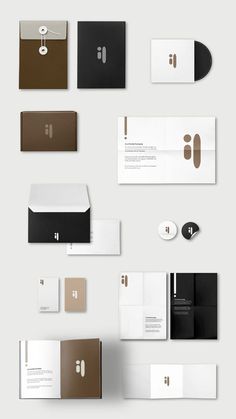 an assortment of business cards and envelopes with different designs on the front, back and sides