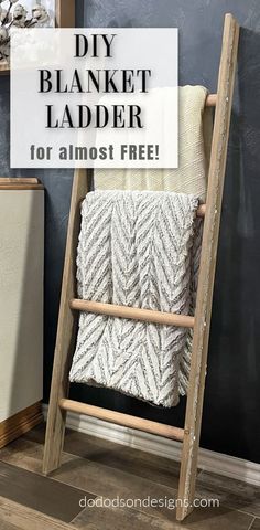 an old ladder is used as a blanket holder for blankets and throws in this diy blanket ladder