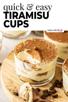 two desserts sitting on top of a wooden cutting board with chocolate chips around them