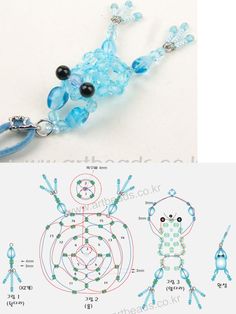 the blue beaded frog charm is attached to a keychain and has black beads on it