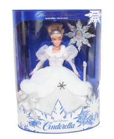 a barbie doll in a white dress with snowflakes