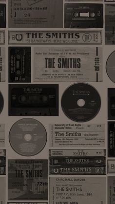 an image of cassette tapes and cds on the wall with words that read, the smiths