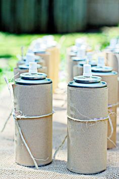 several empty canisters tied up with twine