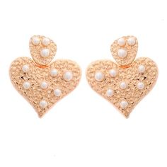 A matte gold textured brass hearts set with glass pearls, the Liza Pearl Heart Earring is modern whimsy with a touch of chic. This is the pair you'll want to wear on repeat! Size: one size. Gender: female. Age Group: adult. Gold Pearl Heart Earrings For Weddings, Feminine Gold Heart Drop Earrings, Feminine Gold Heart Earrings For Valentine's Day, Elegant Metal Earrings With Heart Beads, Gold Pearl Heart Earrings, Gold Heart-shaped Earrings With Pearl Drop, Gold Heart Beads Earrings For Party, Gold Earrings With Heart Beads For Party, Chic Gold Heart Earrings For Wedding