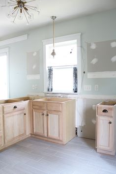 the kitchen is being remodeled with new cabinets