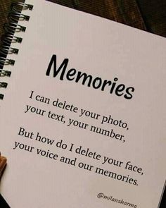 someone is holding up a notepad with the words memories on it and an image of a person's hand