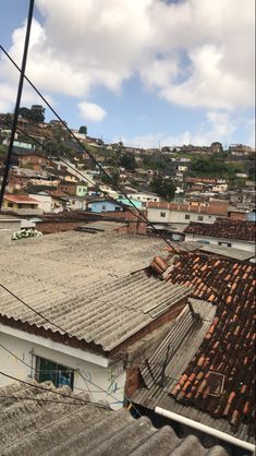 the roofs of houses are covered with clay tiles