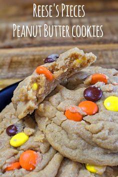 reese's pieces peanut butter cookies are stacked on top of each other with candy