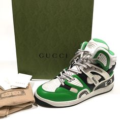 Authentic Gucci “Basket” Sneakers -Model: 661301 -Color: White / Green / Black -Size: Men Us 8.5 / Gucci Size 8 -New With Original Box Details: -Composition: Calf Leather -Rubber Panels -Fabric Lining -Leather Insole -Rubber Sole -Perforated Detail -Side Logo Detail -The Rubber Sole Has A Purposely Worn Look. -Original Gucci Box And Dust Bag Included -Made In Italy === Pictures In This Listing Are From The Actual Item You Would Be Purchasing. Please Refer To Them For Details=== All My Items Are Designer High-top Sneakers With Logo Print, Green Leather Sneakers With Logo Print, Designer High-top Sneakers With Logo For Streetwear, Luxury White High-top Sneakers With Logo, Designer White Sneakers With Logo, Gucci Sporty High-top Sneakers, Gucci High-top Logo Sneakers, Gucci High-top Sneakers With Logo, Custom White High-top Sneakers With Logo Detail