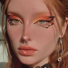 Red Butterfly Eye Makeup, Fairy Wing Eye Makeup, Eye Looks With Gems, Butterfly Tattoo Eye Makeup, Red Butterfly Makeup, Butterfly Tattoo Makeup, Monarch Makeup, Orange Makeup Aesthetic, Manhwa Makeup