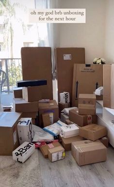 there are many boxes stacked on the floor