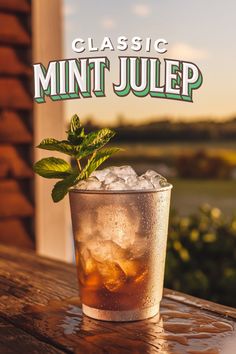 a close up of a drink on a table with the words classic mintjuice