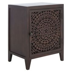 a wooden cabinet with an intricate design on the front and side panel, in dark wood