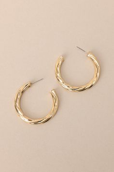 These gold hoop earrings are simply wonderful (see what we did there?) Their classic design makes them the perfect accessory for any outfit. Bring a touch of elegance and playfulness to your look with these earrings. Get ready for compliments! These earrings feature gold hardware. a twist like design. and a secure post backing.    Earrings measure 1.5" in diameter Imported Red Dress Boutique, Gold Hoop, Gold Hoop Earrings, Get Ready, Gold Hardware, Classic Design, Dresses For Sale, Timeless Design, Hoop Earrings