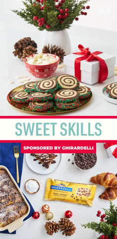 a table topped with lots of different types of desserts and christmas decorations on top of it