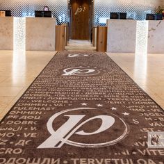 Give your guests the full red carpet treatment in any colour you like! With our customisable logo runners, you can make a grand entrance. Seen here is a stunning example at a hotel reception, featuring an extra-long printed runner that stretches up to 20 meters! Not only does it make a bold statement, but it's also a durable product designed to last a very long time. Transform your space and leave a lasting impression with our bespoke mats. #KleenTex #KleenTexEurope #makemoreofyourfloor