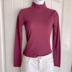 Petal Mauve Forever 21 Lettuce Edge Ribbed Long Sleeve Mock Neck Top Small Nwot. This Gorgeous Cotton-Blend Top Is A Classic Yet Spicy Piece To Pair With Boots And Jeans Or A Skirt. It Is New Without Tags, And In Immaculate Condition. Measurements Are 16” Pit-To-Pit, And 20” In Length. The Top Does Have A Little Bit Of Stretch To It. (Fits A Little On The Shorter Side; Most Regular Tops Are About 23”.) Comes From A Smoke-Free, Doggo Loving Home :) Purple Tops For Fall Layering, Winter Purple Fitted Tops, Fitted Purple Winter Tops, Fitted Purple Tops For Winter, Purple Ribbed Stretch Top, Purple Stretch Ribbed Tops, Purple Fitted Top For Fall, Stretch Purple Ribbed Tops, Fitted Fall Purple Tops