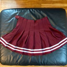 Thick, Good Quality Maroon/Burgundy Cheerleading Skirt. Waist Is About 25" With Zip & Button Closure. Brand New But No Tags. Maroon Cheer Uniforms, Preppy Red Fitted Skort, Preppy Red Skort For School, Red Mini Tennis Skirt For School, Preppy Fitted Red Mini Skirt, Preppy Red Pleated Mini Skirt, Casual Red Tennis Skirt For School, Red Pleated Mini Skirt In Preppy Style, Red Pleated Preppy Mini Skirt