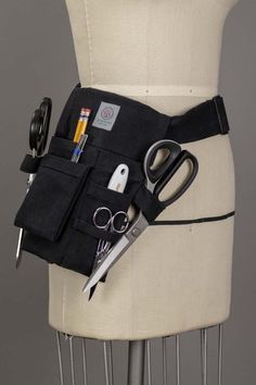 The Workroom Social Tool Belt is designed specifically for sewists and is useful to anyone who carries tools. We love having all our tools on us when we’re working on a project, but we’re constantly leaving our scissors over here and seam ripper over there. This belt is perfect for keeping all your tools organized and Tool Belt Sewing Pattern, Sewing Tool Belt, Tool Belt Diy, Apron Belt, Sewn Accessories, Sew Accessories, Tool Apron, Tools Bag, Tool Pouches