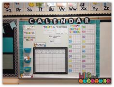 a bulletin board with the word calendar on it in front of a whiteboard that says,