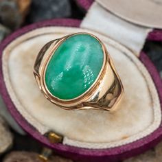 This handsome vintage mens ring is bezel set with an oval cabochon jadeite jade. The ring is crafted in 10k yellow gold with a nice patina and is currently a size 10. Vintage 14k Gold Oval Cabochon Emerald Ring, Vintage 14k Gold Emerald Oval Cabochon Ring, Vintage Oval Jade Emerald Ring, Vintage Green Signet Ring With Polished Finish, Vintage Green 14k Gold Signet Ring, Green Oval Signet Ring Collectible, Vintage Polished Emerald Ring With Oval Cabochon, Vintage Oval Cabochon Emerald Ring With Polished Finish, Vintage Emerald Oval Cabochon Ring With Polished Finish