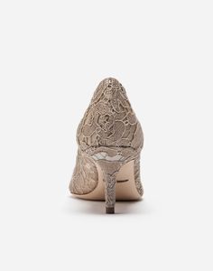 Featuring an iconic, timeless shape, these Bellucci pumps from the Rainbow collection come in lace. Feminine and elegant, they flaunt the iconic brooch made from colorful crystals that match the upper. Lace-covered mesh upper 60 mm - 2.4 inches heel Kidskin insole with branded label Branded leather sole Item comes with themed packaging Made in Italy Rainbow Heels, Shoes Dolce Gabbana, Embroidered Slippers, Crystal Pumps, Rainbow Laces, Colorful Crystals, Beige Pumps, Dress Loafers, Unique Shoes