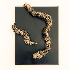 a piece of art that looks like a snake