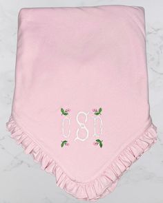 Personalized monogrammed baby blanket featuring initials surrounded by four rose petals. Blanket is constructed of 2 ply 6 plus ounces of 100% combed cotton.Approximately 30 x 30 inches and features a ruffled edge binding. Super soft, and grows softer with each washing. Rose buds and initials can be any color you like, just mention in notes to seller. Thanks Monogram Baby Girl, Baby Girl Blanket, Pink Monogram, Baby Monogram, Stroller Blanket, Personalized Embroidered, Swaddle Blanket, Cotton Bedding