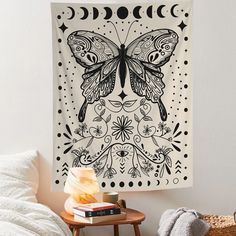 a wall hanging with a butterfly on it