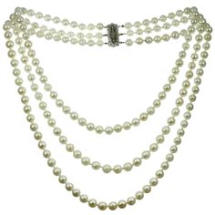 This classic modern necklace features three rows of 6.0mm -7.0mm cultured pearls of medium luster and creamy color. Completed with a 14k white gold clasp. Made in United States circa 2000s. Measurements: 0.27" (7mm) width, 17" (43.1cm) length. Necklaces Beaded, Modern Necklace, Vintage Beads Necklace, Bling Necklace, Cultured Pearl Necklace, Modern Necklaces, Necklace Choker, Cultured Pearls, Beaded Necklaces