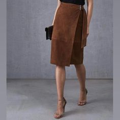 Size Us 4. Fits A Size Extra Small-Small. Model Is A Size Small To Medium. Measurements Laying Flat: Waist: 13’’-14’’ (Adjustable) Length: 27’’ Great Condition. Retails For $595.00. Description: Designer 100% Goat Leather High-Waisted Midi Pencil Skirt With A Banded Waist, Darted Back, Crossover Wrap Front With A Buckled Sash Closure, Asymmetric Front Hem, Panelled Design, And Tonal Stitching. #Reiss #Skirt #Suede #Leather #Designer Midi Skirt Brown, Wrap Midi Skirt, Knit Pencil Skirt, Power Dressing, Suede Belt