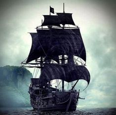 an old pirate ship sailing in the ocean