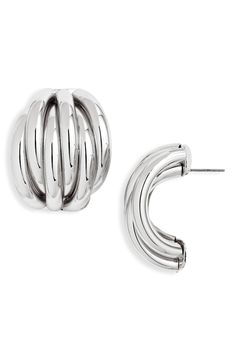 An interlocked design gives dimensional shine to these hoop earrings. 1 1/4" hoop diameter Post back Goldtone plate or rhodium plate Imported Open Hoop Earrings Front, Silver Hypoallergenic Open Circle Hoop Earrings, Unique Nickel-free Spiral Hoop Earrings, Unique Spiral Nickel-free Hoop Earrings, Nickel-free Spiral Metal Hoop Earrings, Fabric Gift Bags, Keep Jewelry, Anniversary Sale, Fabric Gifts