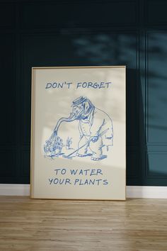 a poster on the floor that says don't forget to water your plants