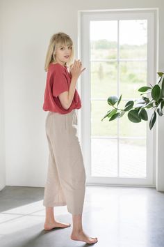 "Comfortable and lightweight linen pants REIMS fit perfectly to each figure and body type. DETAILS: <> Made from OEKO-TEX® certified 100 % European linen; <> Color in the picture: Beige; <> Linen pants REIMS with elastic waistband; <> Pants with two pockets; <> Model is wearing S size; Pants length: Outseam ± 88 cm / 34.7\", Inseam ± 62 cm / 24.4\"; <> Model height 183 cm / 6′; <> Product is made with family love. The quality of linen fabrics and product Relaxed Linen Trousers, Ankle-length Linen Loungewear Bottoms, Linen Tapered Leg Pants For Loungewear, Relaxed Flax-colored Straight Pants, Relaxed Flax Colored Straight Pants, Relaxed Straight Flax Pants, Relaxed Fit Linen Trousers, Relaxed Fit Flax Pants, Relaxed Ankle-length Linen Pants