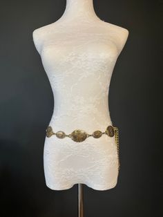 Quality metal disc belt in antique brass finish. This fashionable belt is beautiful with its disc design.  Exclusively designed by FAN Design, FAN Fashion Colour: Choose from Antique Brass or Silver Finish.  Hand made in a range of sizes.  Teen sizes though to waist size 60". For larger belts send me a convo.  Perfect wardrobe accessory or gifts. Vintage Gold Chain Belt For Festivals, Gold Bohemian Belt For Festivals, Bohemian Gold Belt For Festival, Gold Bohemian Festival Belt, Vintage Adjustable Gold Belt, Gold Belts With Antique Buckle And Adjustable Fit, Adjustable Gold Bohemian Belt, Gold Adjustable Bohemian Belt, Gold Bohemian Adjustable Belt