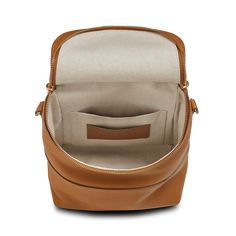 The same style and convenience as our Convertible Pocket Backpack in a smaller, more-compact size. The Mini Pocket Backpack gives you a hands-free experience while keeping all your necessities handily within reach. | Shinola Women's Mini Pocket Backpack Leather Camera Bag With Removable Pouch, Luxury Pouch Backpack For Everyday Use, Leather Pouch Camera Bag, Everyday Cognac Backpack With Leather Lining, Formal Leather Backpack With Detachable Strap, Classic Leather-lined Standard Backpack, Top Handle Camera Bag With Removable Pouch For Travel, Travel Bag In Cognac With Zipper Closure, Travel Backpack With Adjustable Strap And Pouch Shape