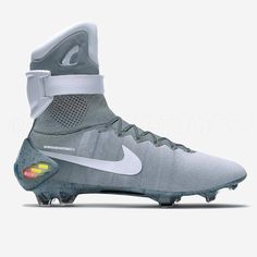 the nike football cleats have been designed to look like they are wearing grey and white