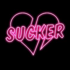 a neon sign that says sucker in the shape of a heart