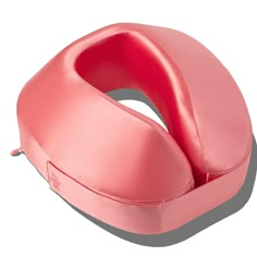 a pink toilet seat cover on a white background with the lid up and it's open