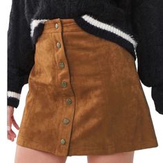 Forever 21 Faux Suede Mini Skirt. A-Line. Snap Front Closures. Mini Length. New With Tags Measured Laying Flat: Waist: 13” Length: 15” Color: Camel Size: Small Sb2 Trendy Brown Mini Skirt For Fall, Trendy Brown Fall Mini Skirt, Trendy Fall Skirt, Trendy Fall Pencil Skirt, Fall Mini Skort With Button Closure, Trendy Brown Mini Skirt With Button Closure, Trendy High-waist Fall Skort, Trendy High-waist Skort For Fall, Trendy High Waist Fall Skort