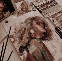 a woman with curly hair is shown in this artistic drawing class photo and it's finished