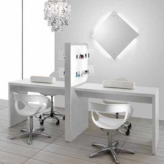 a white desk with two chairs and a mirror